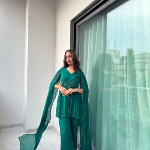 woman wearing emerald green cape style kurta